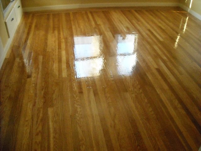 Before and after hardwood floor refinishing - high grade red oak flooring.