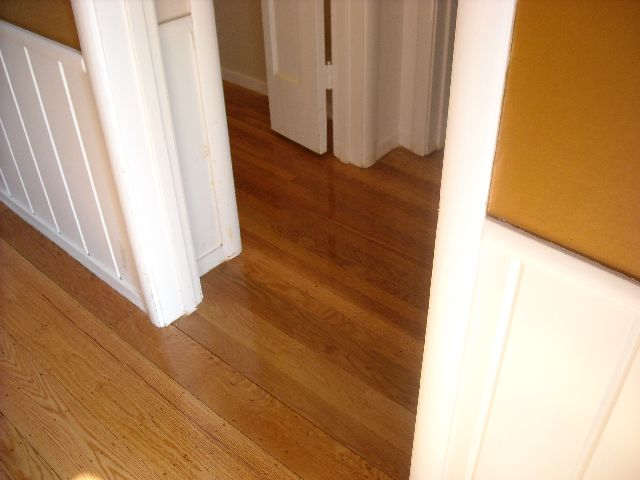 Before and after hardwood floor refinishing - Land Park beautiful wide plank red oak floors