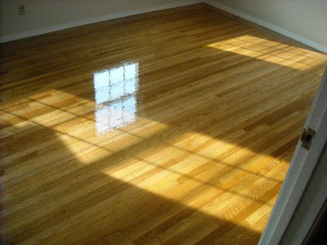 Before and after hardwood floor refinishing - Land Park beautiful wide plank red oak floors 3